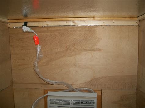 is it code to run extension cord into metal box|running extension cord through exterior wall.